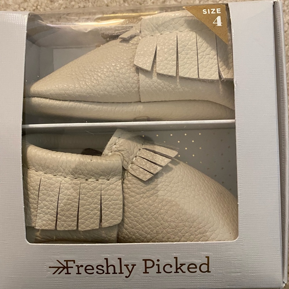 Freshly picked cream moccasins size 4 never been worn with box
